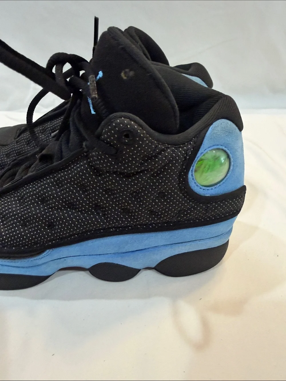 Jordan Men's Black and University Blue Retro Sneakers